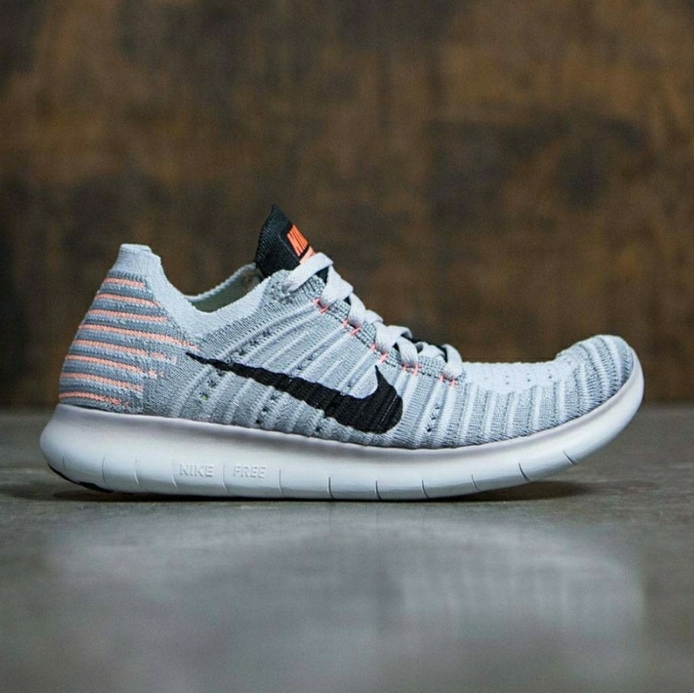 Brand new Nike Free Run Flyknit size 9 1/2 Mango